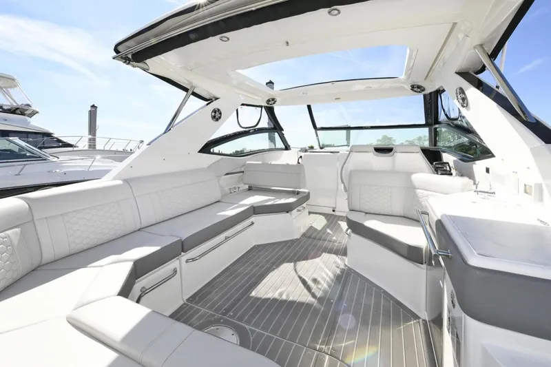  Yacht Photos Pics Luxurious interior of 2022 Sea Ray Sundancer 320 yacht with spacious seating and modern design.