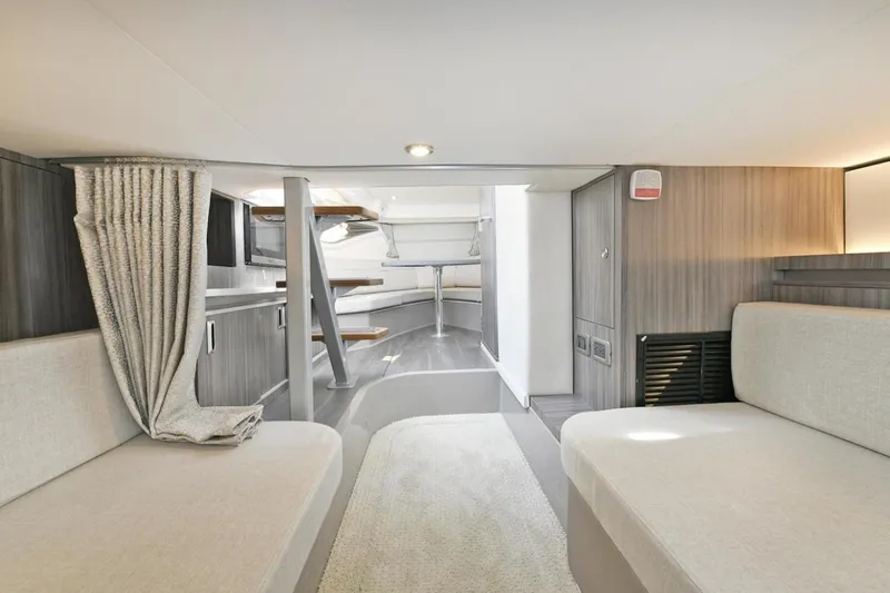  Yacht Photos Pics Interior of 2022 Sea Ray Sundancer 320 yacht, featuring modern seating and elegant design.