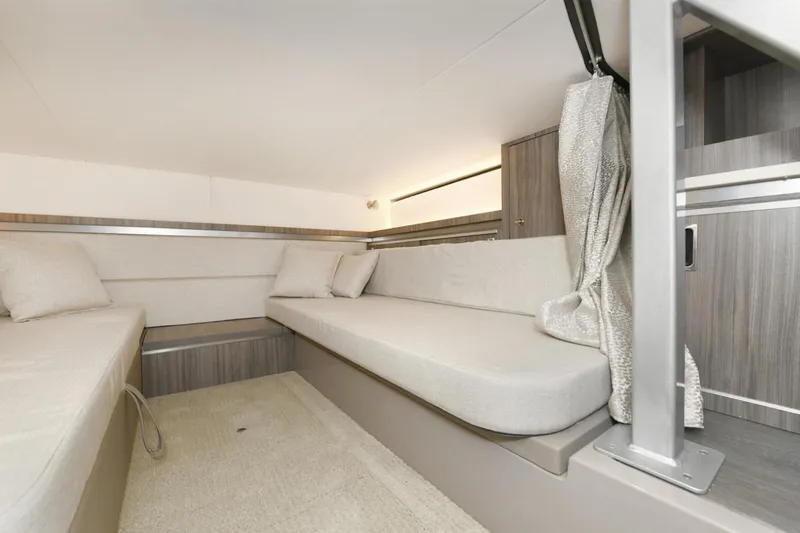  Yacht Photos Pics Interior cabin of 2022 Sea Ray Sundancer 320 with modern seating and neutral decor.