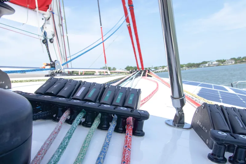 Out Of The Woods Yacht Photos Pics 2022 NEEL 51 sailboat with colorful ropes and controls.
