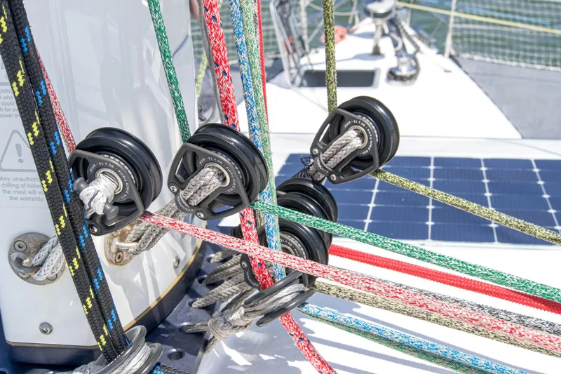 Out Of The Woods Yacht Photos Pics Colorful ropes and pulleys on a 2022 NEEL 51 trimaran.
