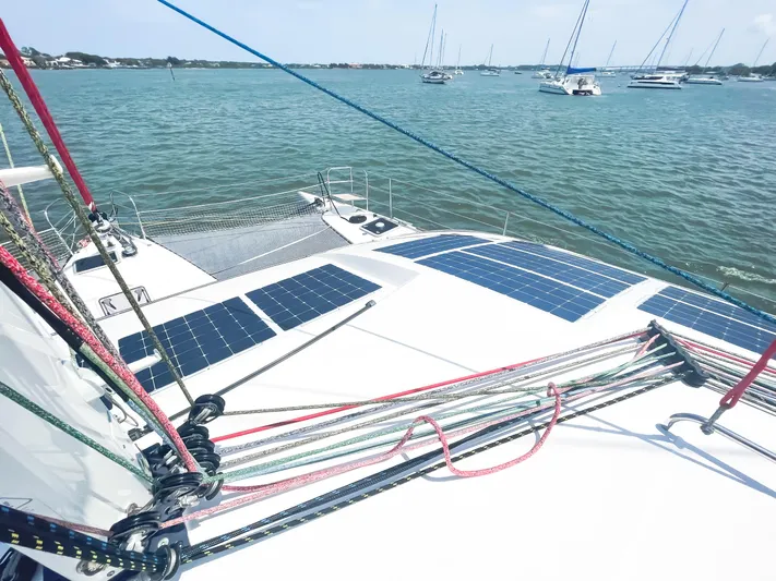 Out Of The Woods Yacht Photos Pics NEEL 51 trimaran with solar panels on deck, 2022 model.
