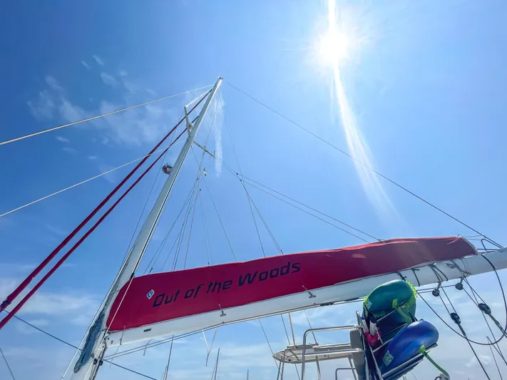 Out Of The Woods Yacht Photos Pics NEEL 51 sailboat under sunny sky, 2022 model.