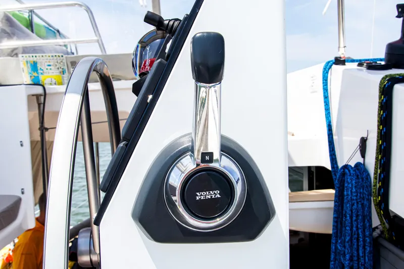 Out Of The Woods Yacht Photos Pics Volvo Penta throttle on NEEL 51 trimaran, year 2022.