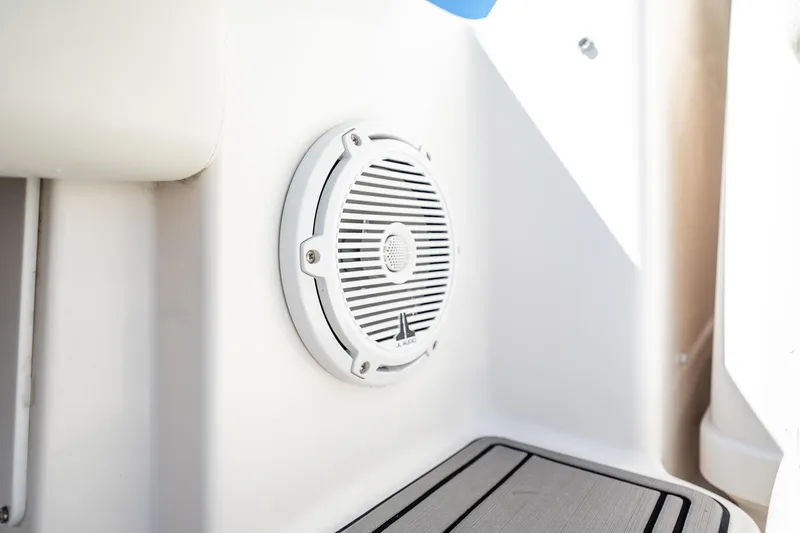 Maggie Yacht Photos Pics White speaker on 2005 Tiara Yachts 3200 Open, mounted on sleek interior panel.