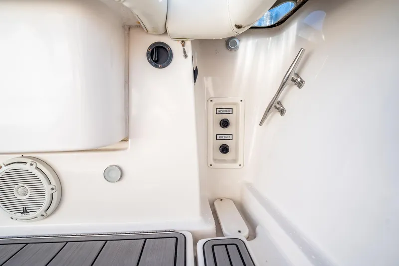 Maggie Yacht Photos Pics 2005 Tiara Yachts 3200 Open interior with water controls and speaker.