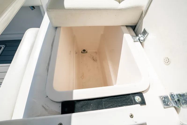 Maggie Yacht Photos Pics Open storage compartment on a 2005 Tiara Yachts 3200 Open boat.