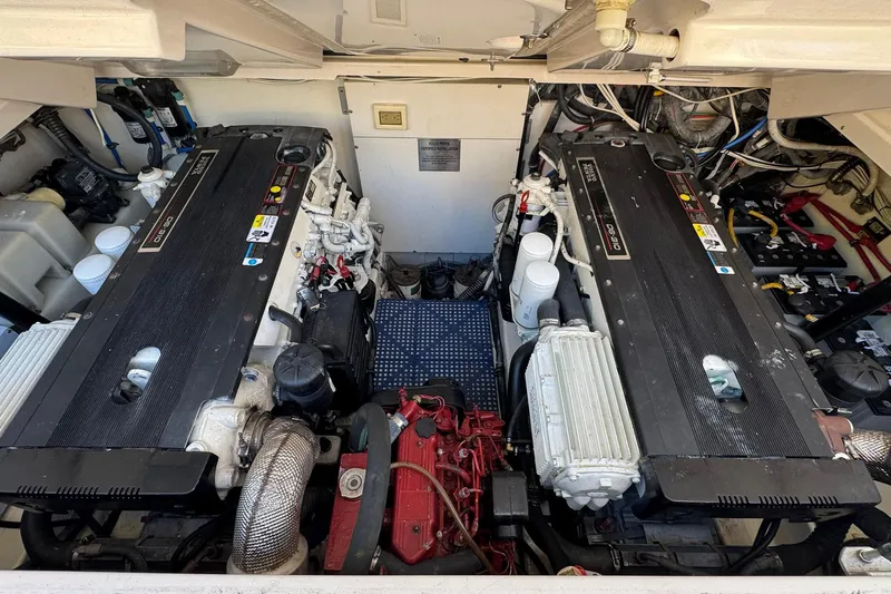 Maggie Yacht Photos Pics Engine room of a 2005 Tiara Yachts 3200 Open, featuring dual diesel engines.