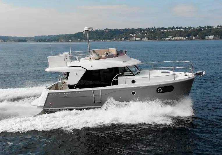 Everything Is Fine Yacht Photos Pics 2019 Beneteau Swift Trawler 30 cruising on open water.