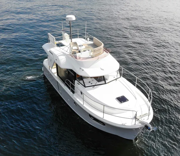 Everything Is Fine Yacht Photos Pics 2019 Beneteau Swift Trawler 30 cruising on open water.