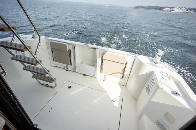 Everything Is Fine Yacht Photos Pics 2019 Beneteau Swift Trawler 30 deck with ocean view and stairs.