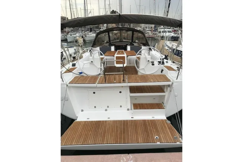  Yacht Photos Pics 2019 Dufour 460 Grand Large yacht with teak deck and dual steering wheels.