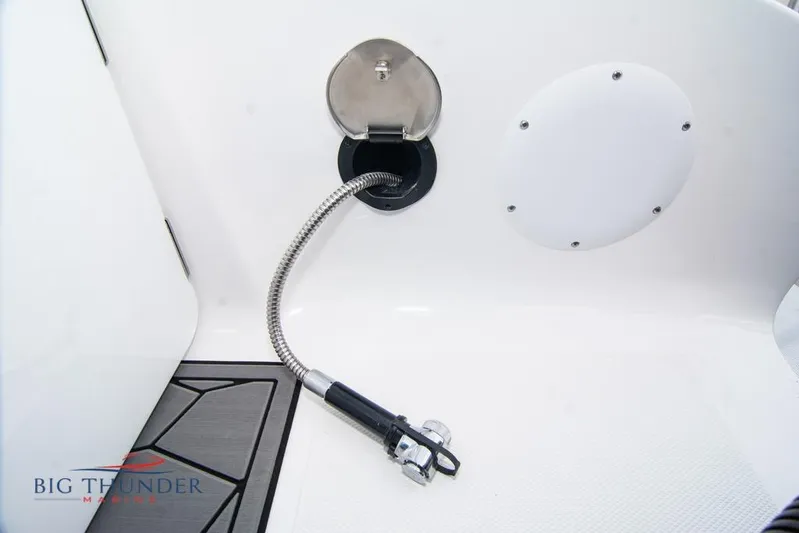  Yacht Photos Pics 2022 Fountain 38 SC boat deck with hose and fittings.