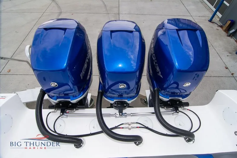  Yacht Photos Pics Triple blue Mercury outboard engines on a 2022 Fountain 38 SC boat.