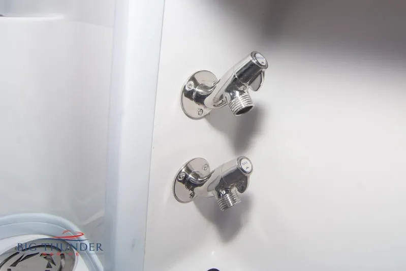  Yacht Photos Pics Chrome faucets on a 2022 Fountain 38 SC boat interior.