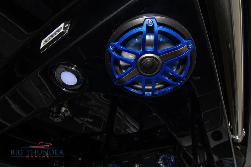 Yacht Photos Pics 2022 Fountain 38 SC boat interior with blue speaker and lighting detail.
