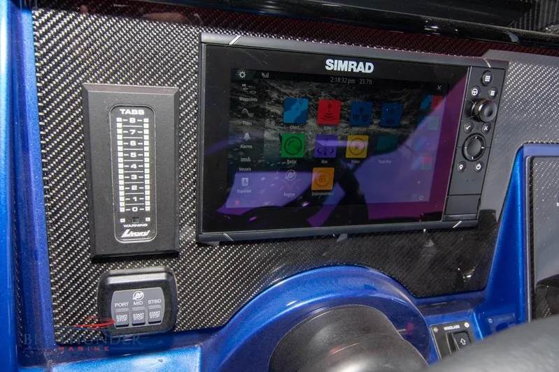  Yacht Photos Pics Dashboard of 2022 Fountain 38 SC boat with Simrad navigation system.