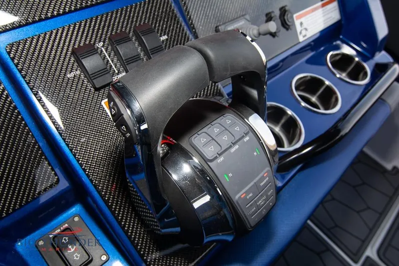  Yacht Photos Pics Control panel of 2022 Fountain 38 SC boat with carbon fiber accents.