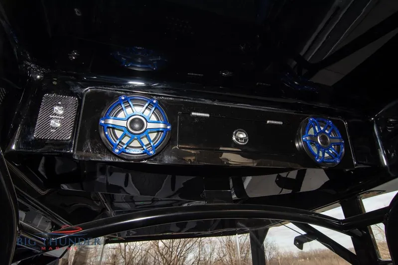  Yacht Photos Pics 2022 Fountain 38 SC boat audio system with blue speakers and sleek black design.