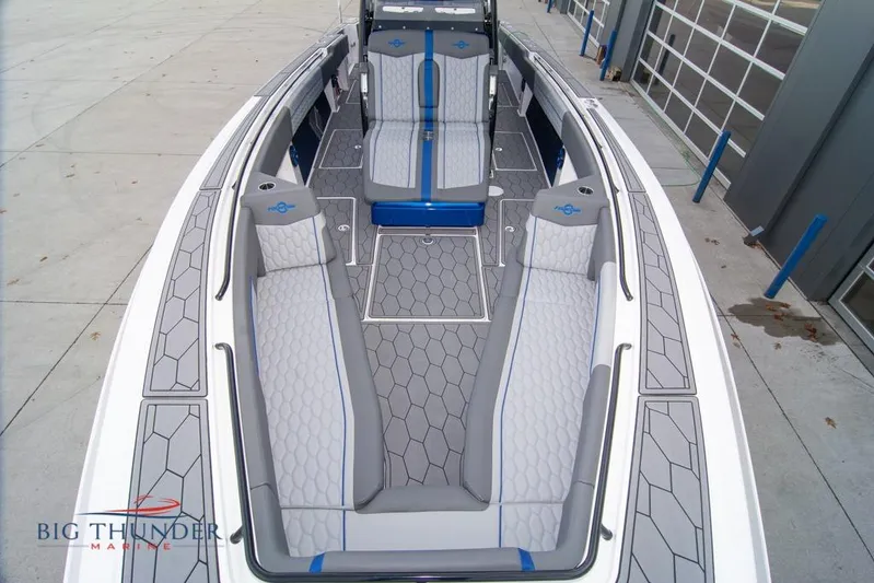  Yacht Photos Pics 2022 Fountain 38 SC boat interior with modern seating and sleek design.