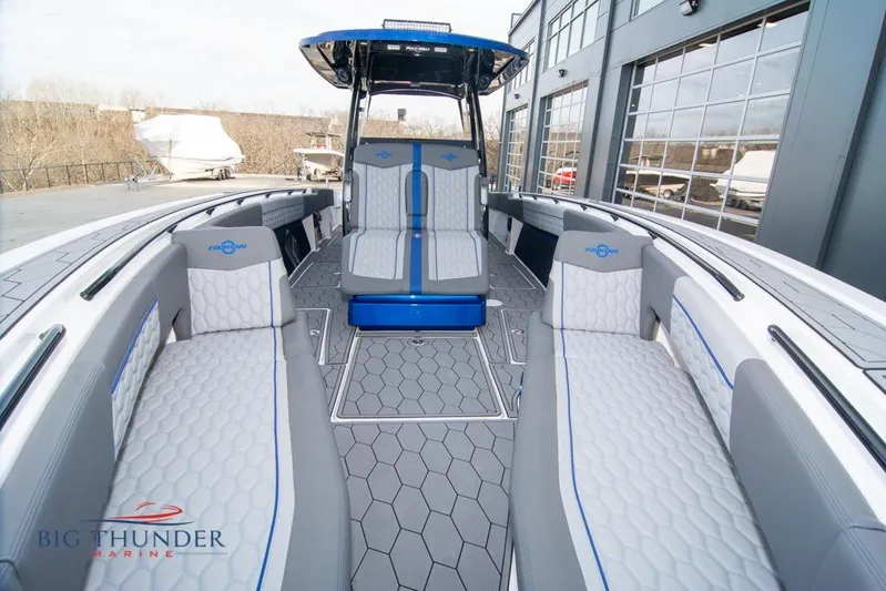  Yacht Photos Pics 2022 Fountain 38 SC boat interior with modern seating and sleek design.