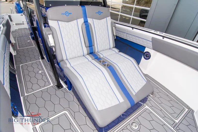  Yacht Photos Pics 2022 Fountain 38 SC boat interior with stylish seating and modern design.