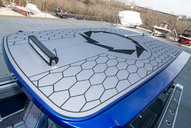  Yacht Photos Pics 2022 Fountain 38 SC boat with hexagonal pattern deck and LED light bar.