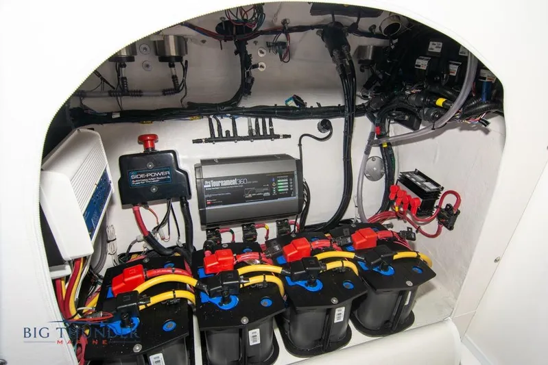  Yacht Photos Pics 2022 Fountain 38 SC boat electrical system with batteries and wiring components.