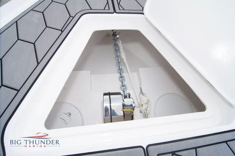  Yacht Photos Pics Anchor compartment of 2022 Fountain 38 SC boat with chain and rope.