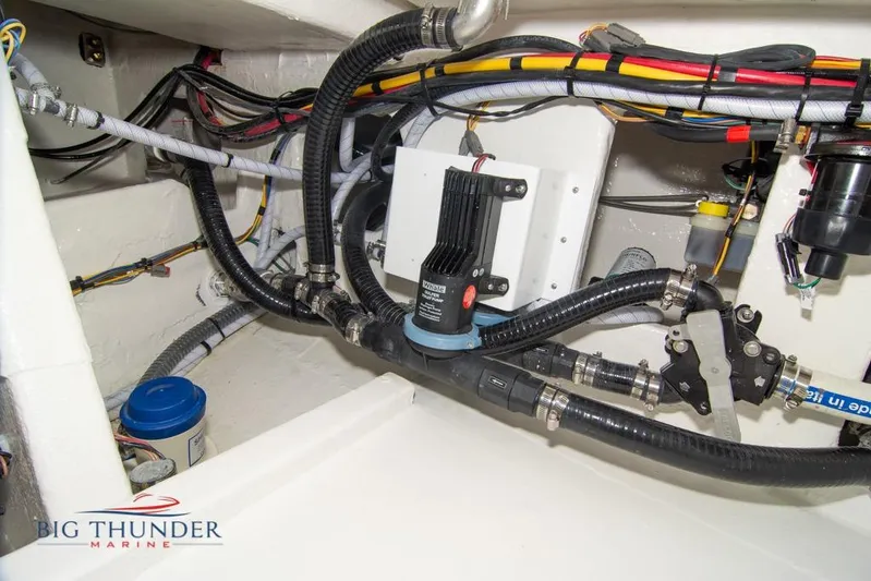  Yacht Photos Pics Engine compartment of 2022 Fountain 38 SC boat with wiring and plumbing systems.