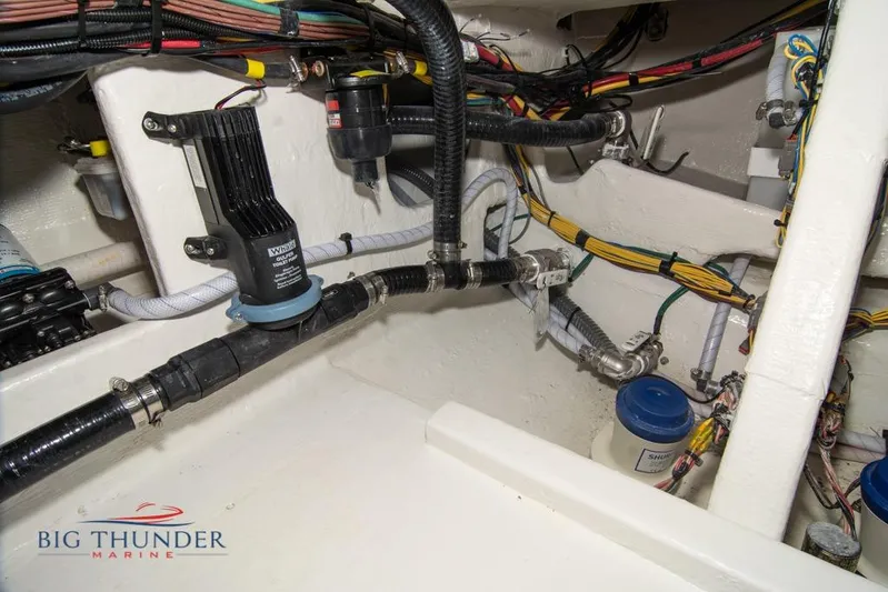  Yacht Photos Pics Engine compartment of 2022 Fountain 38 SC boat with wiring and plumbing systems.