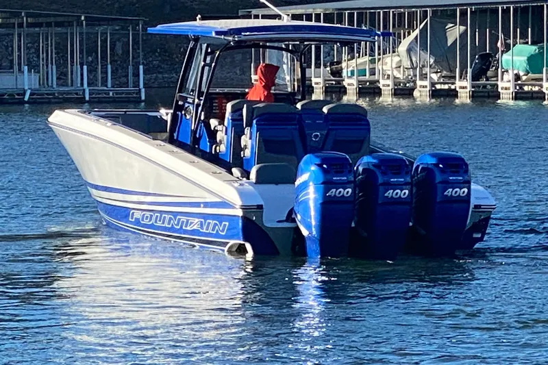  Yacht Photos Pics 2022 Fountain 38 SC boat with triple 400 horsepower engines on the water.