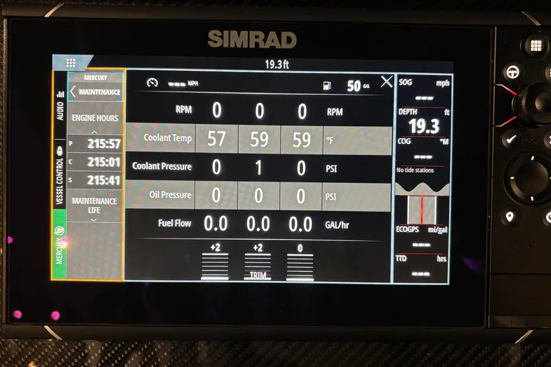  Yacht Photos Pics Simrad display on 2022 Fountain 38 SC showing engine metrics and navigation data.