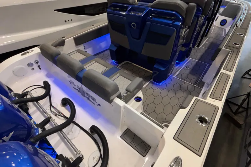  Yacht Photos Pics 2022 Fountain 38 SC boat interior with blue lighting and modern seating.