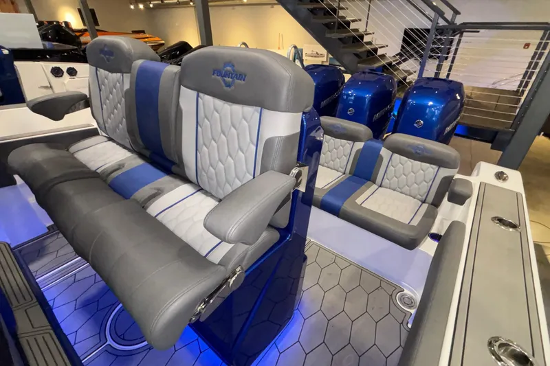  Yacht Photos Pics 2022 Fountain 38 SC boat interior with luxurious seating and modern design.