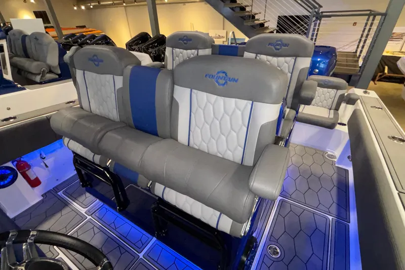  Yacht Photos Pics 2022 Fountain 38 SC boat interior with stylish seating and modern design.