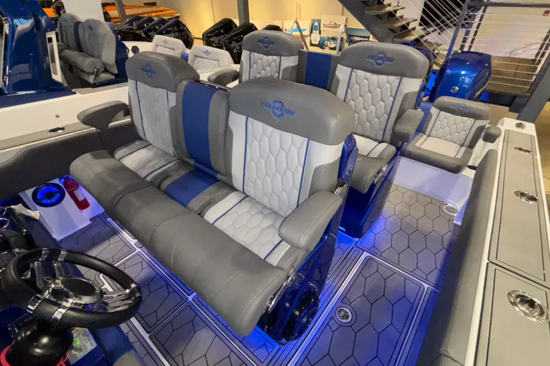  Yacht Photos Pics 2022 Fountain 38 SC boat interior with luxurious seating and modern design.