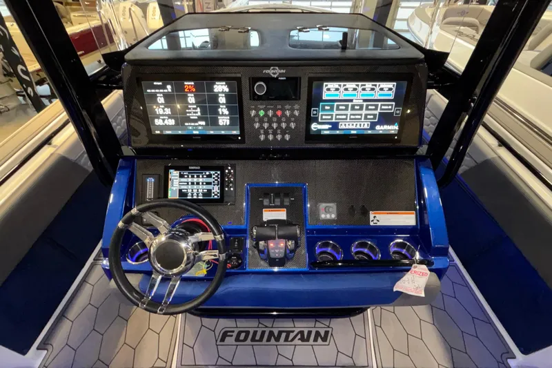  Yacht Photos Pics 2022 Fountain 38 SC boat dashboard with advanced navigation and control systems.