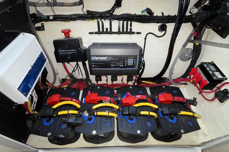  Yacht Photos Pics Electrical system of a 2022 Fountain 38 SC boat with batteries and wiring.