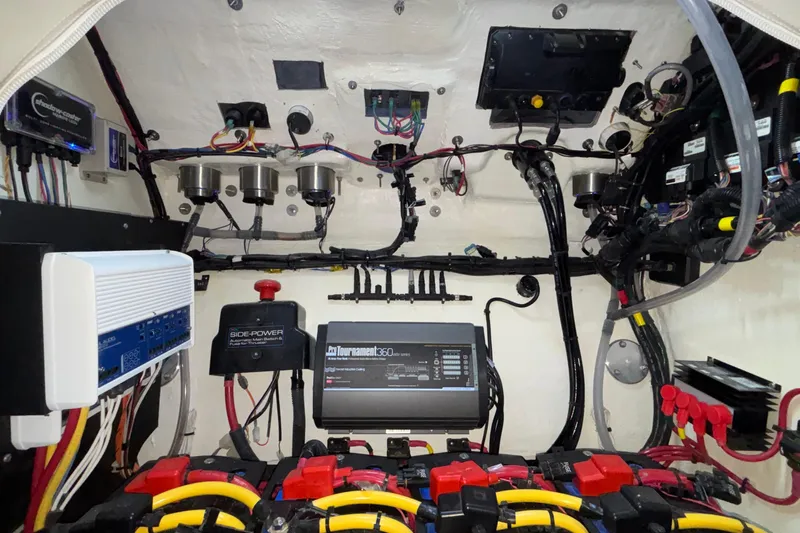  Yacht Photos Pics Electrical system inside 2022 Fountain 38 SC boat, showcasing wiring and components.