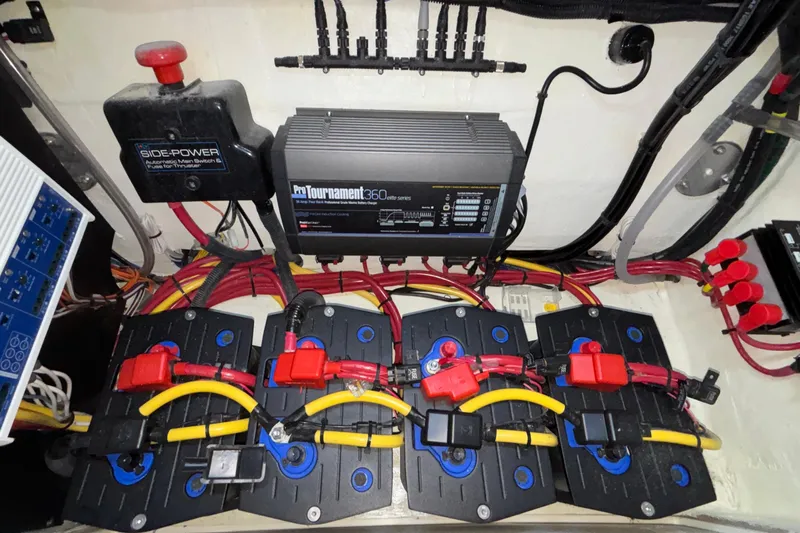  Yacht Photos Pics Electrical system of a 2022 Fountain 38 SC boat with batteries and wiring.