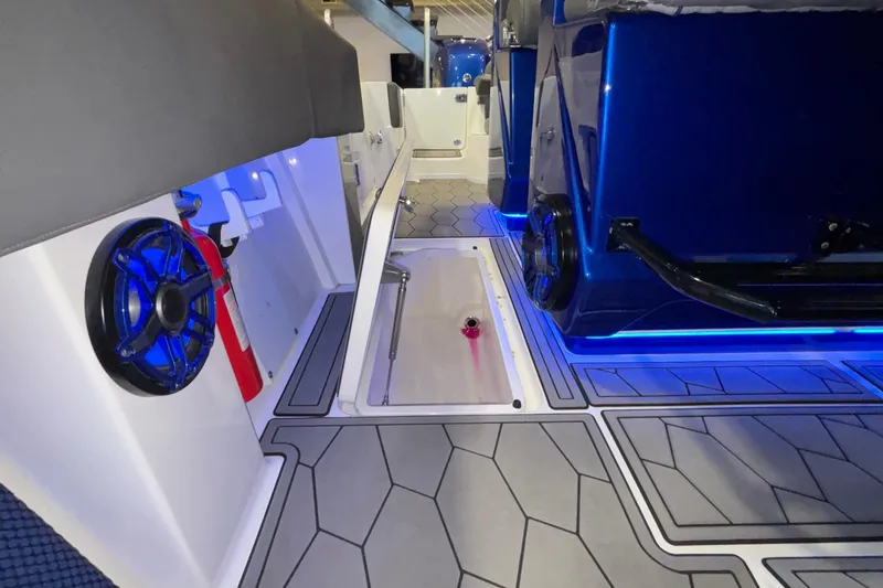  Yacht Photos Pics 2022 Fountain 38 SC boat interior with blue LED lighting and modern design elements.