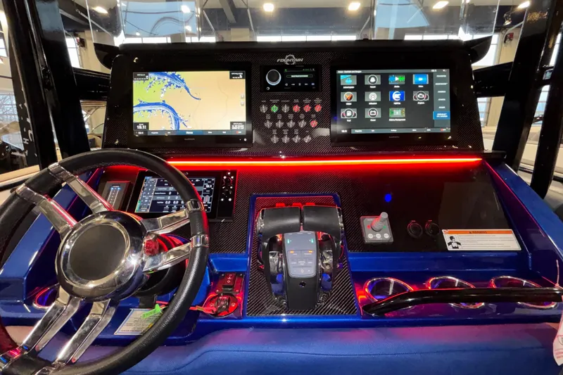  Yacht Photos Pics 2022 Fountain 38 SC boat dashboard with advanced navigation and control systems.