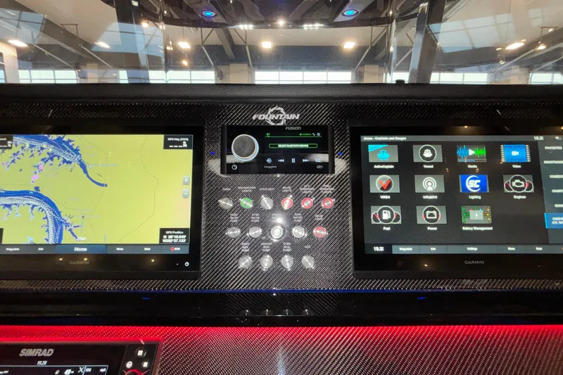  Yacht Photos Pics Dashboard of 2022 Fountain 38 SC boat with navigation and control screens.
