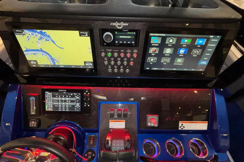  Yacht Photos Pics 2022 Fountain 38 SC boat dashboard with advanced navigation and control systems.