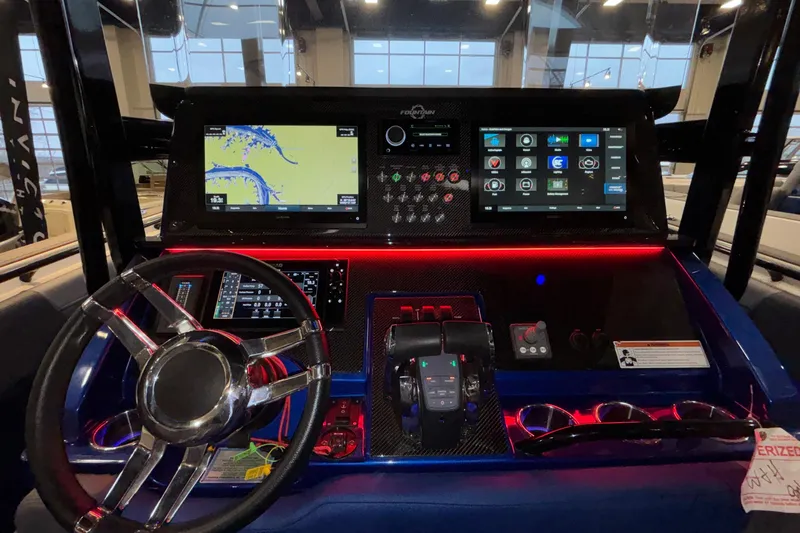 Yacht Photos Pics Control panel of 2022 Fountain 38 SC boat with advanced navigation displays.