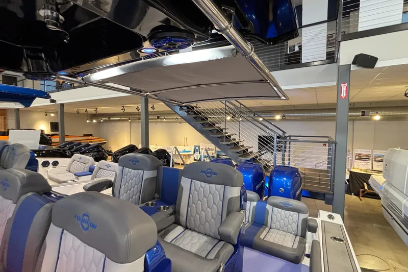  Yacht Photos Pics 2022 Fountain 38 SC boat interior with luxurious seating and modern design.