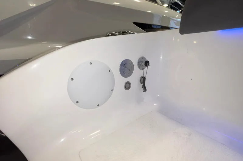  Yacht Photos Pics Interior view of 2022 Fountain 38 SC boat, featuring control panel and key slot.