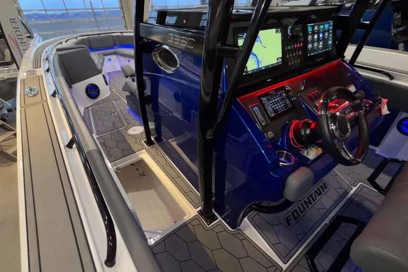  Yacht Photos Pics 2022 Fountain 38 SC boat interior with advanced navigation system and modern design.
