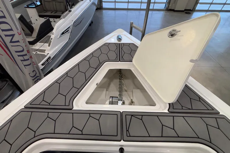  Yacht Photos Pics 2022 Fountain 38 SC boat anchor compartment with open hatch, showcasing modern design.